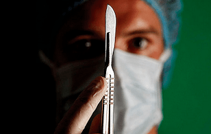 The surgeon is preparing for surgery to increase the member